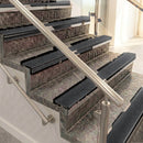Raked back aluminium stair nosing, black anodised with black olympic grip insert