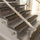 Raked back aluminium stair nosing, black anodised with bronze aluminium insert