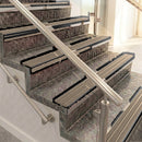 Raked back aluminium stair nosing, black anodised with fawn castellated insert