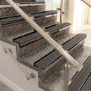 Raked back aluminium stair nosing, black anodised with granite castellated insert