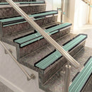 Raked back aluminium stair nosing, black anodised with jade castellated insert