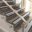 Raked back aluminium stair nosing, black anodised with mill aluminium insert