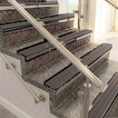 Raked back aluminium stair nosing, black anodised with peat castellated insert