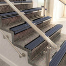 Raked back aluminium stair nosing, black anodised with regency castellated insert