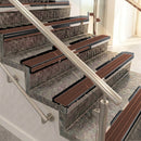 Raked back aluminium stair nosing, black anodised with rustic castellated insert