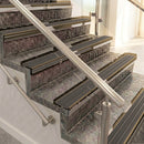 Raked back aluminium stair nosing, bronze with granite castellated insert