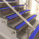 Raked back aluminium stair nosing, bronze with mid blue castellated insert