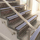 Raked back aluminium stair nosing, bronze with nimbus castellated insert