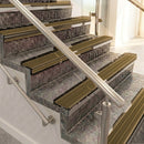 Raked back aluminium stair nosing, bronze with olive castellated insert