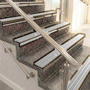 Raked back aluminium stair nosing, bronze with polished aluminium insert