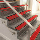 Raked back aluminium stair nosing, bronze with poppy castellated insert