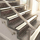 Raked back aluminium stair nosing, bronze with porth stone smooth textured insert