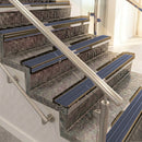 Raked back aluminium stair nosing, bronze with regency castellated insert