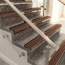 Raked back aluminium stair nosing, bronze with rustic castellated insert