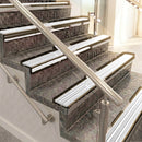 Raked back aluminium stair nosing, bronze with white castellated insert