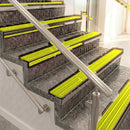Raked back aluminium stair nosing, bronze with yellow castellated insert