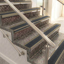 Raked back aluminium stair nosing, light bronze with black olympic grip insert