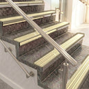 Raked back aluminium stair nosing, light bronze with ivory castellated insert