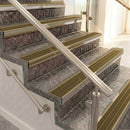 Raked back aluminium stair nosing, light bronze with olive castellated insert