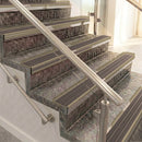 Raked back aluminium stair nosing, light bronze with peat castellated insert