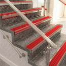 Raked back aluminium stair nosing, light bronze with poppy castellated insert