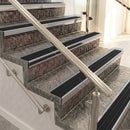 Raked back aluminium stair nosing, mill aluminium with black anodised aluminium insert