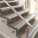 Raked back aluminium stair nosing, mill aluminium with light grey smooth textured insert