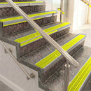 Raked back aluminium stair nosing, mill aluminium with yellow castellated insert