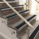 Raked back aluminium stair nosing, polished aluminium with black anodised aluminium insert