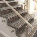 Raked back aluminium stair nosing, polished aluminium with fawn castellated insert
