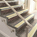 Raked back aluminium stair nosing, polished aluminium with ivory castellated insert