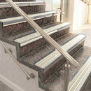 Raked back aluminium stair nosing, polished aluminium with porth stone castellated insert