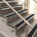 Raked back aluminium stair nosing, satin aluminium with black anodised aluminium insert