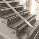 Raked back aluminium stair nosing, satin aluminium with granite castellated insert