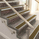Raked back aluminium stair nosing, satin aluminium with olive castellated insert