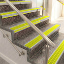 Raked back aluminium stair nosing, satin aluminium with yellow castellated insert