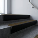 Black Anodised raked back aluminium stair nosing 62x55mm with Olive Castellated infill, fitted to a concrete step