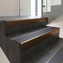 Bronze raked back aluminium stair nosing 62x55mm with Regency Castellated infill, fitted to a concrete step