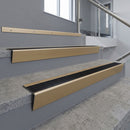 Light Bronze raked back aluminium stair nosing 62x55mm with Black Anodised Aluminium infill, fitted to a concrete step