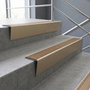 Light Bronze raked back aluminium stair nosing 62x55mm with Bronze Aluminium infill, fitted to a concrete step
