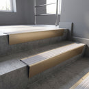 Light Bronze raked back aluminium stair nosing 62x55mm with Nimbus Castellated infill, fitted to a concrete step