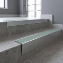 Mill Aluminium raked back aluminium stair nosing 62x55mm with Jade Castellated infill, fitted to a concrete step