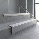 Mill Aluminium raked back aluminium stair nosing 62x55mm with Satin Aluminium infill, fitted to a concrete step