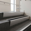 Satin Aluminium raked back aluminium stair nosing 62x55mm with Black Castellated infill, fitted to a concrete step