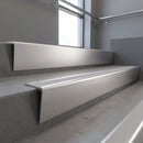 Satin Aluminium raked back aluminium stair nosing 62x55mm with Mill Aluminium infill, fitted to a concrete step