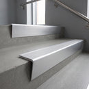 Satin Aluminium raked back aluminium stair nosing 62x55mm with Polar Grey Smooth Textured infill, fitted to a concrete step