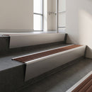 Satin Aluminium raked back aluminium stair nosing 62x55mm with Rustic Castellated infill, fitted to a concrete step