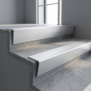 Satin Aluminium raked back aluminium stair nosing 62x55mm with Satin Aluminium infill, fitted to a concrete step