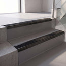 Square edge with ramped back aluminium stair nosing, 70mm tread, coal (black) exterior grip insert, satin black finish