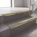 Square edge with ramped back aluminium stair nosing, 70mm tread, everest (light grey) exterior grip insert, mirrorflect gold finish